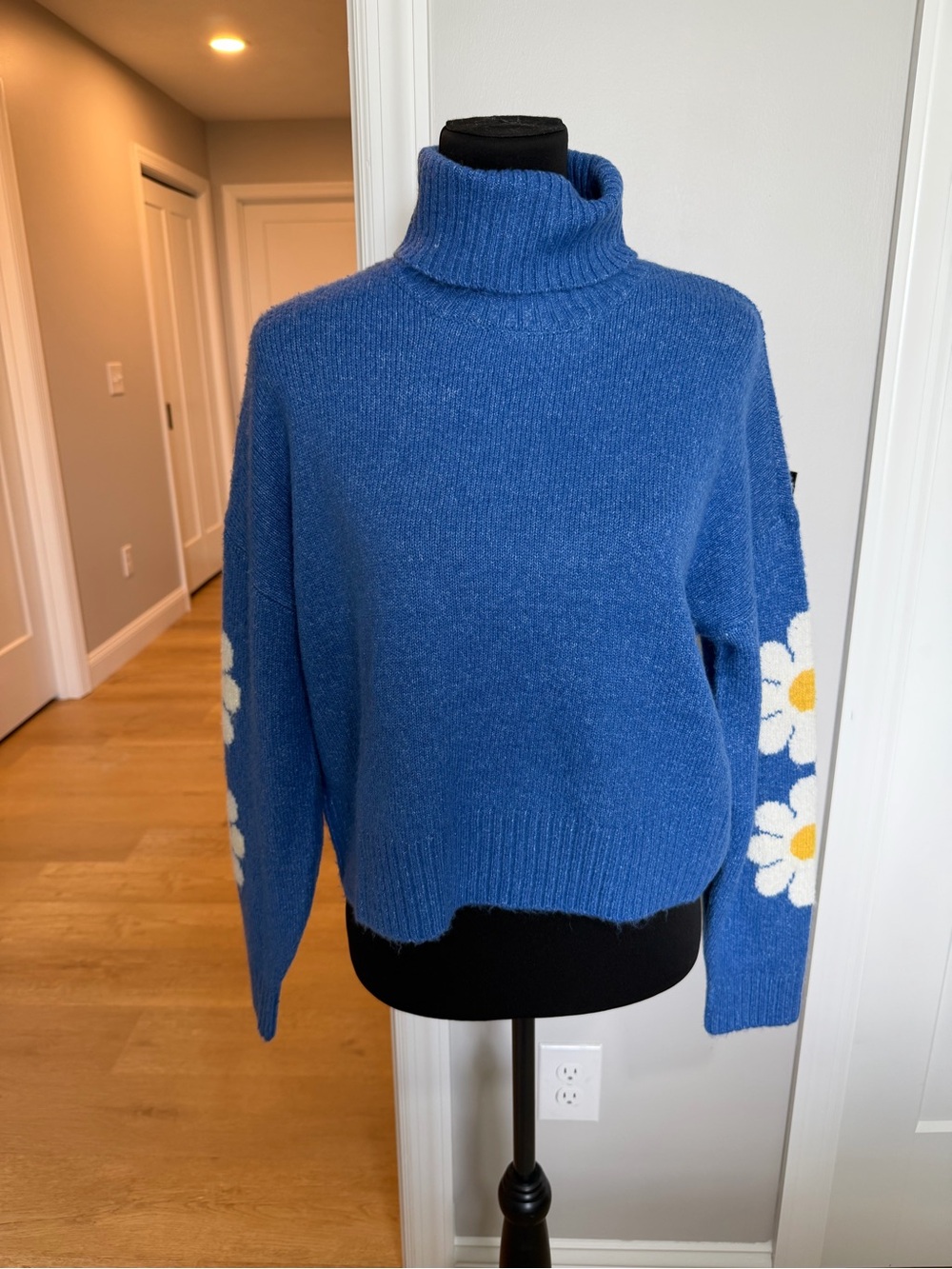 Blue Turtleneck Sweater with Daisy Sleeve Detail